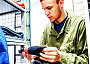 Cadet Flight Sergeant Levi Layh inspects a bear safety kit, checking its condition and ensuring expiry dates are valid, at Cold Lake Cadet Training Centre in Cold Lake, Alberta on July 9, 2026