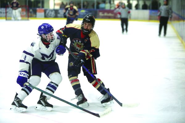 Tigers edged in overtime opener